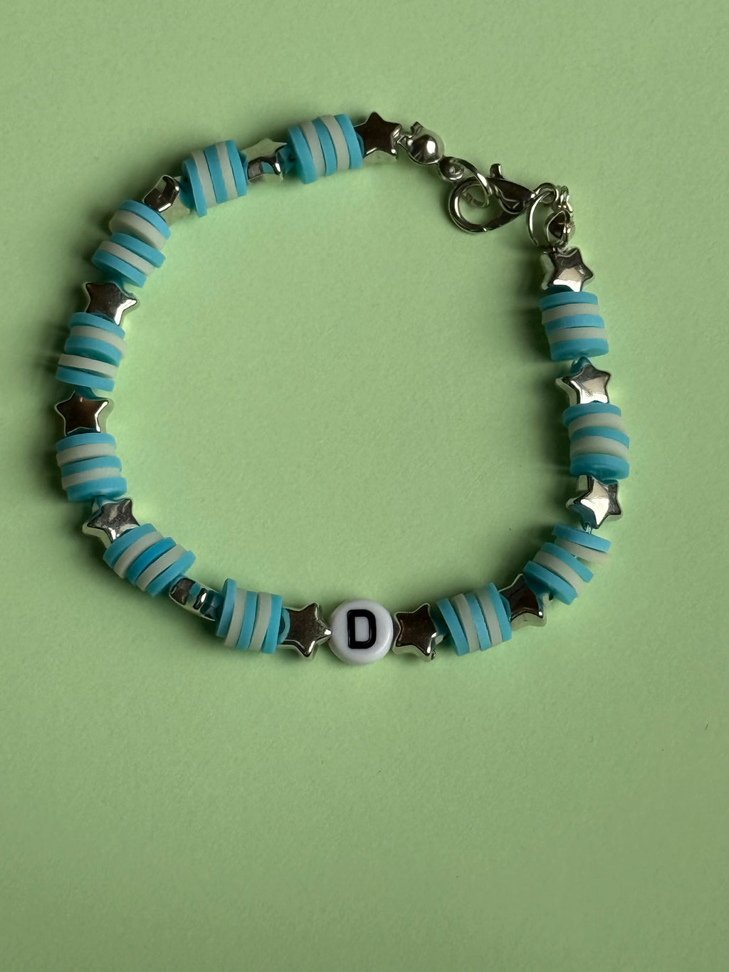 Blue and white beads, silver stars and letter 'D' size 17.5cm
