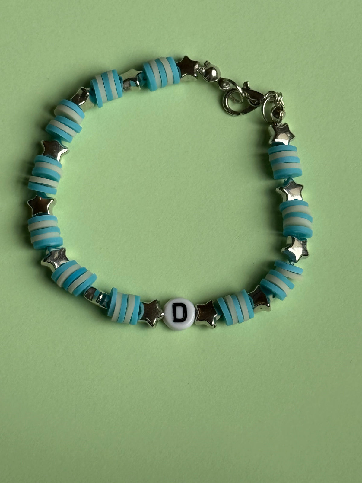 Blue and white beads, silver stars and letter 'D' size 17.5cm