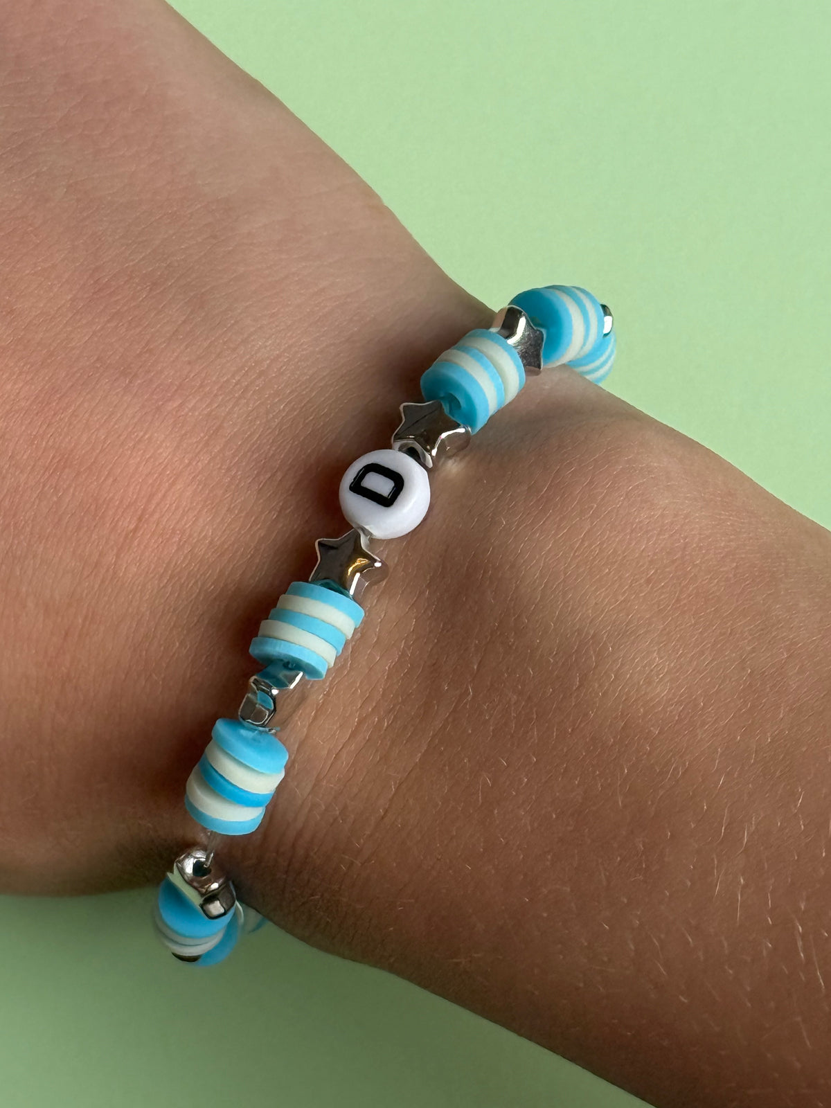 Blue and white beads, silver stars and letter 'D' size 17.5cm